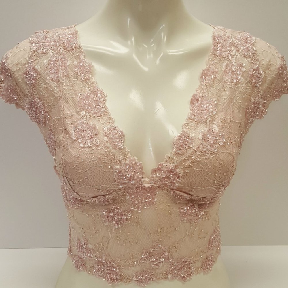 Hand beaded pastel pink cap sleeve lace crop top.